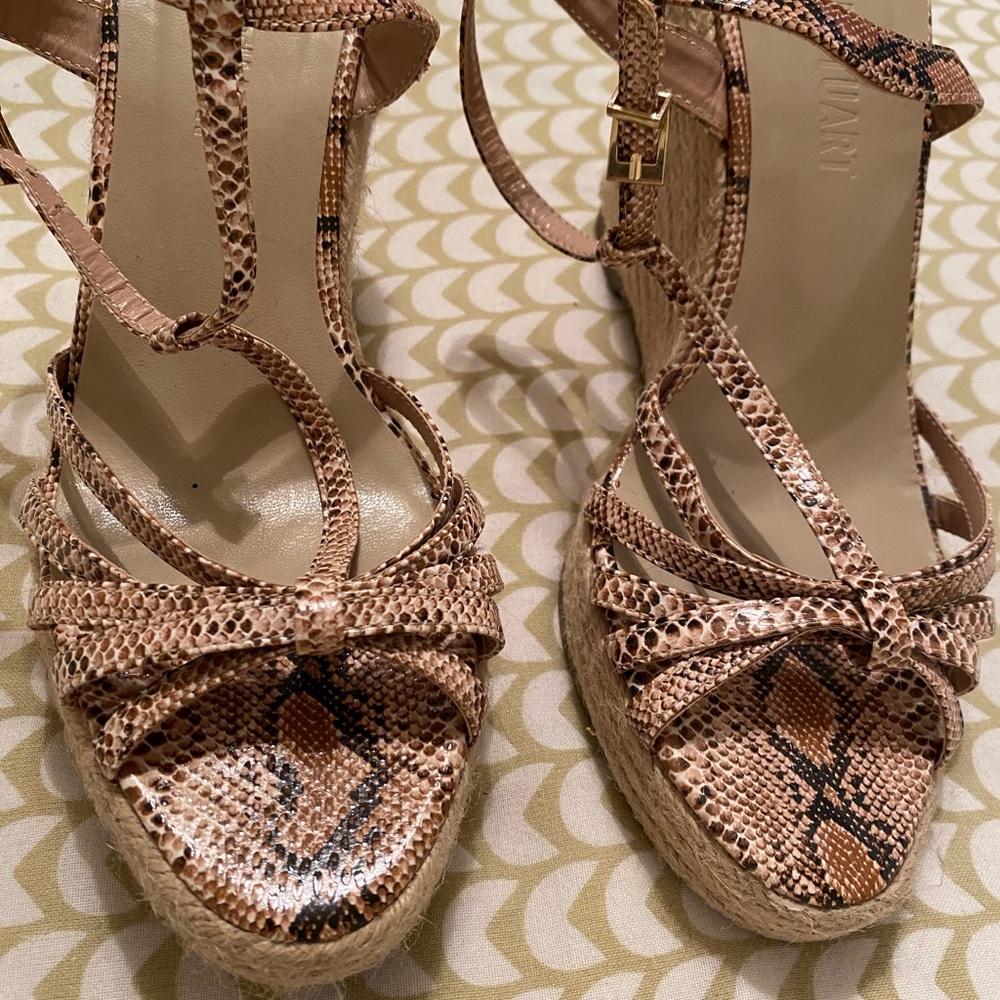 Snakeskin print strappy platform sandals with corded heel. NWOT